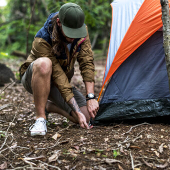 Friends camping in the forest together